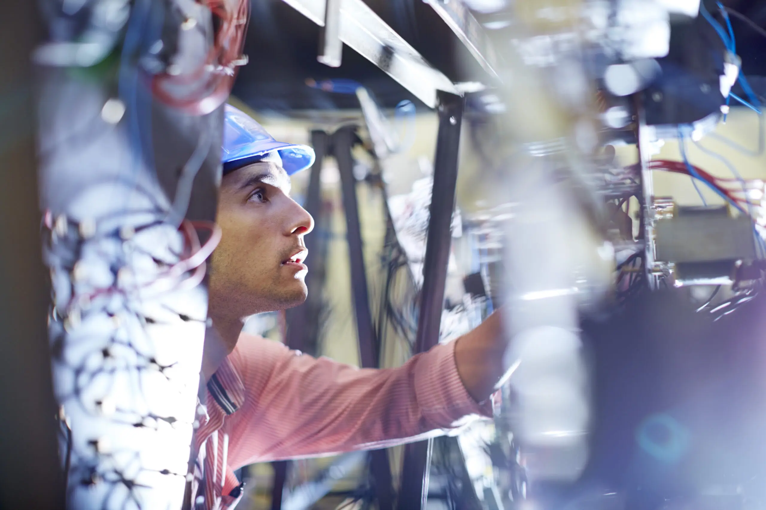 Electrician testing wires